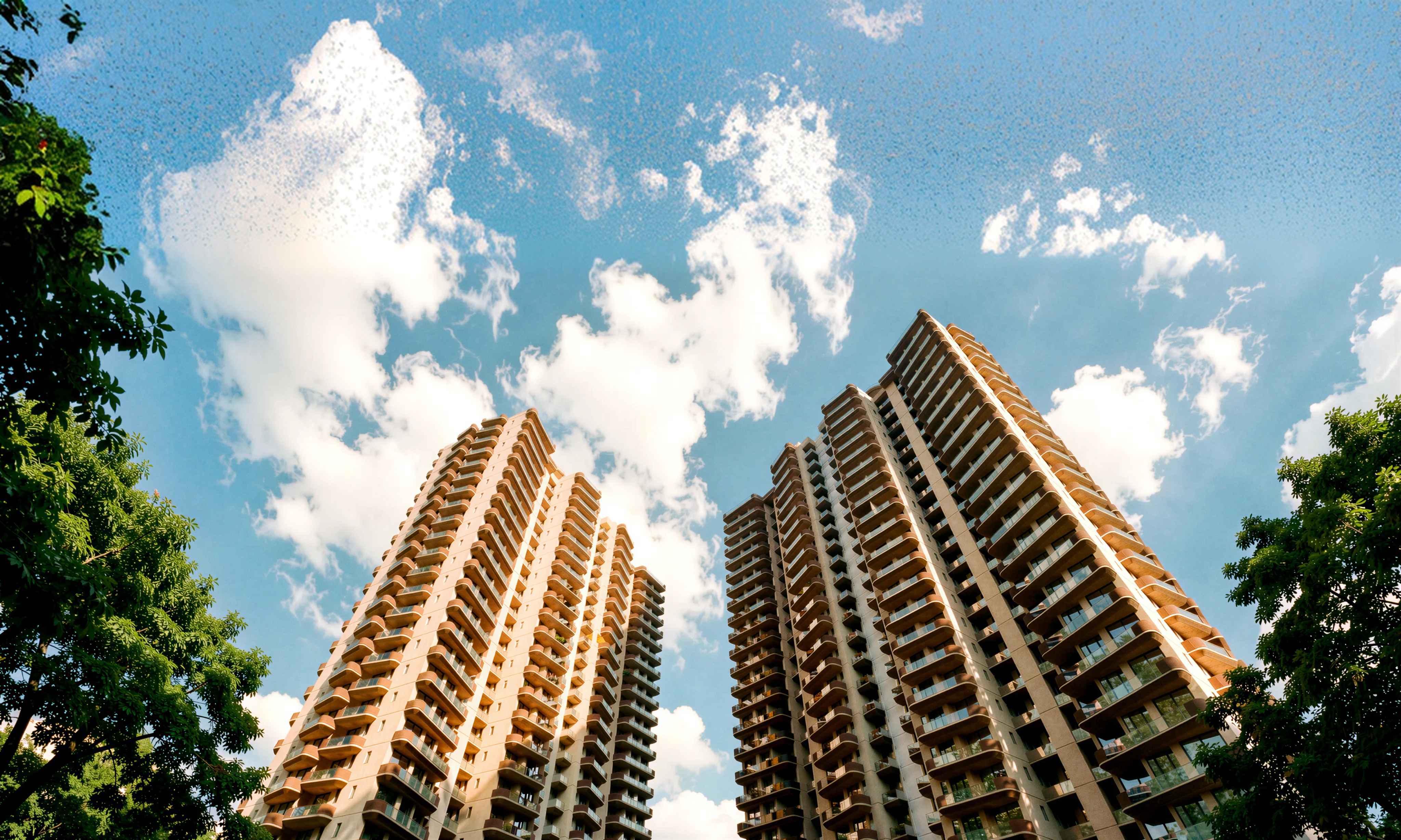 Serenia residential towers against a bright sky